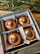 Globuri de Crăciun TETRAO cognac mat - coarne 8 cm, 4 buc